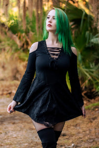 Occultist Dress, a witchy style long sleeve mini dress with lace accents, open shoulders, and a lace up chest, front view