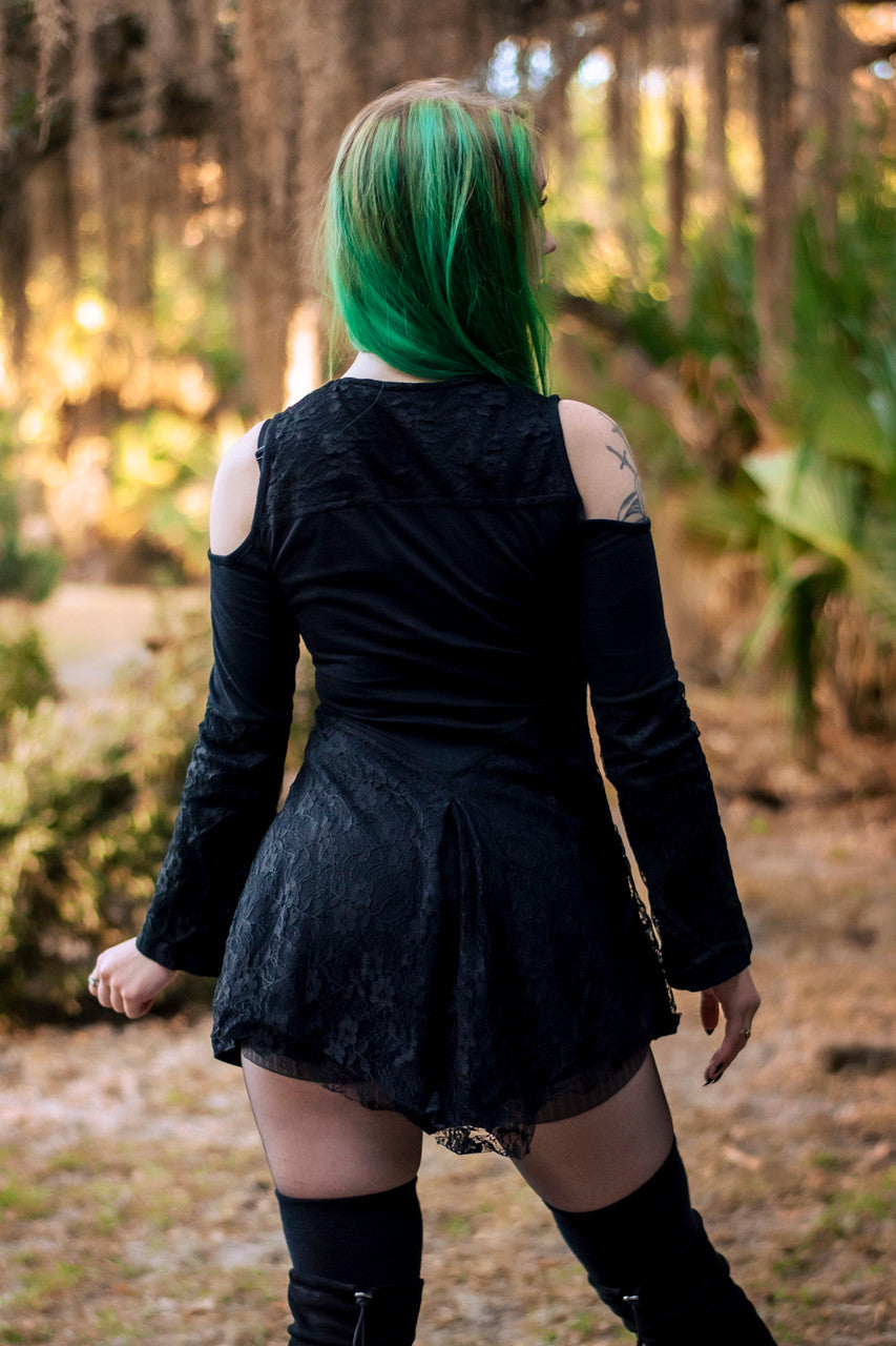 Occultist Dress, a witchy style long sleeve mini dress with lace accents, open shoulders, and a lace up chest, back view