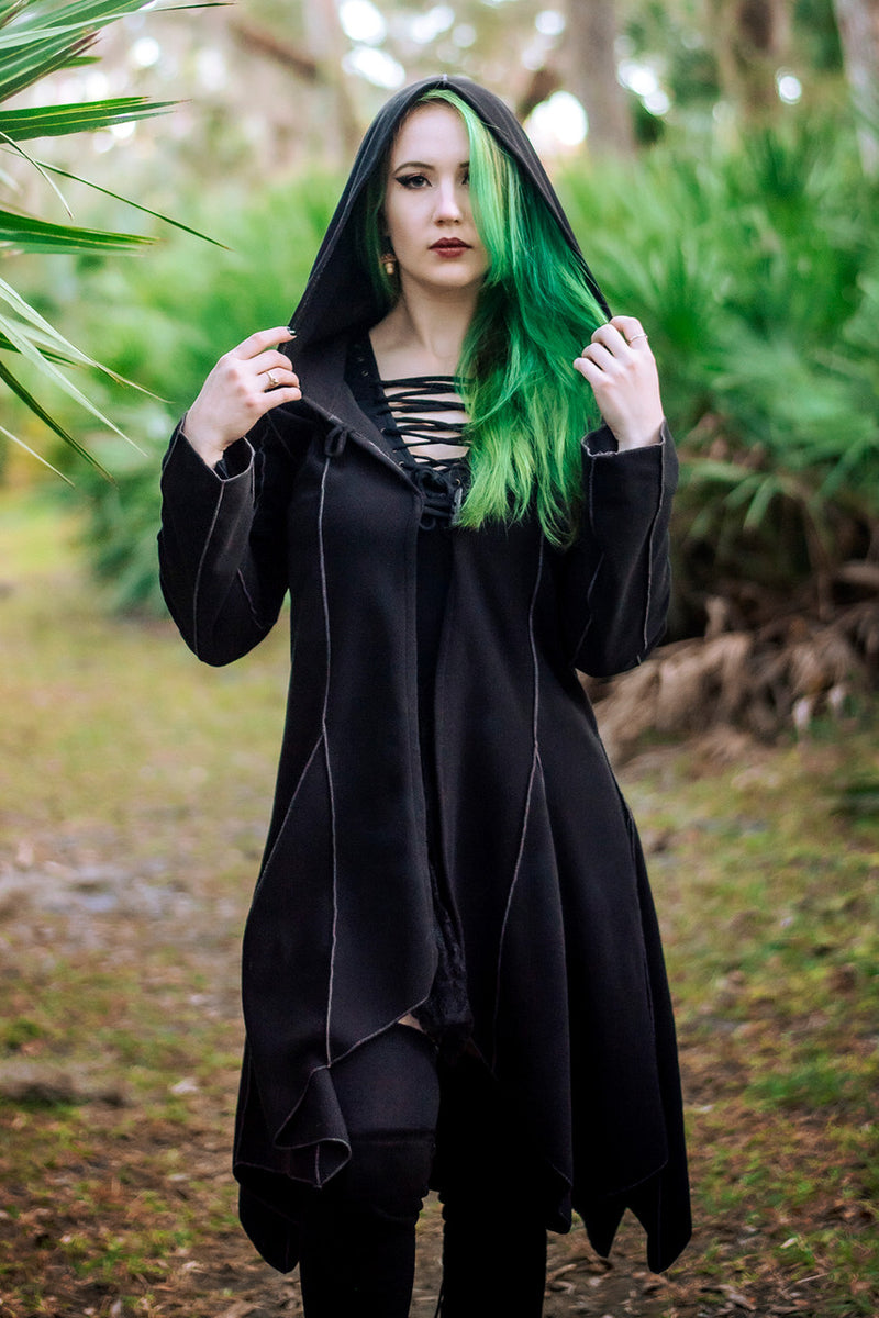 Conjurer's Coat in black hood up front angle.
