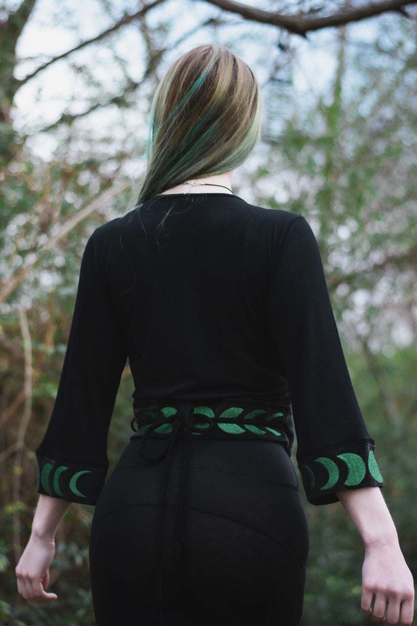 Artemis Crop Kimono, black with black velvet trim and forest green moon phase embroidery, back view