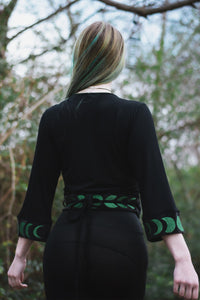 Artemis Crop Kimono, black with black velvet trim and forest green moon phase embroidery, back view