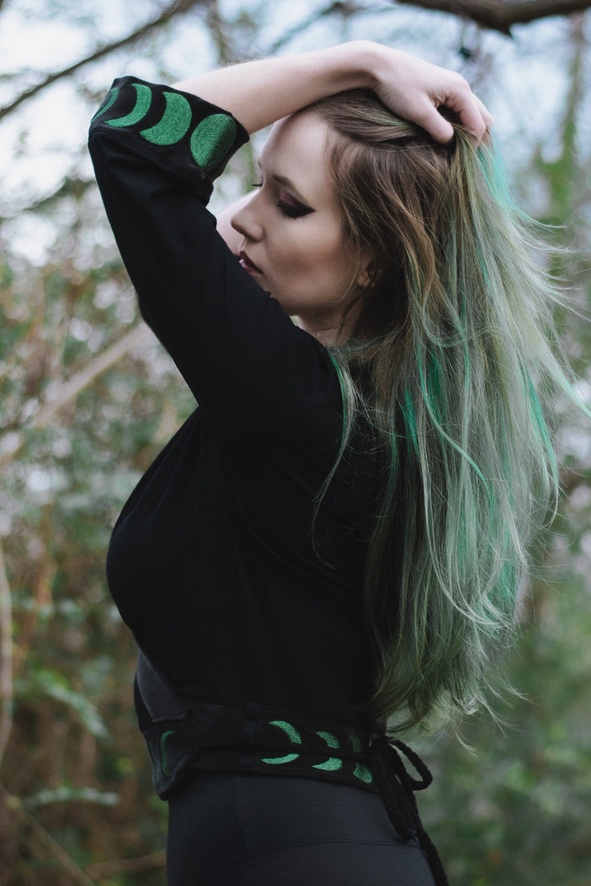 Artemis Crop Kimono, black with black velvet trim and forest green moon phase embroidery, left side view