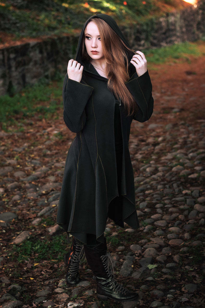 Conjurer's Coat in olive green with the hood up.
