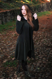 Conjurer's Coat in olive green with the hood up.